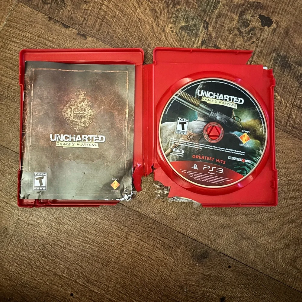 Sony Uncharted: Drake's Fortune PS3  with game manual - Red Case